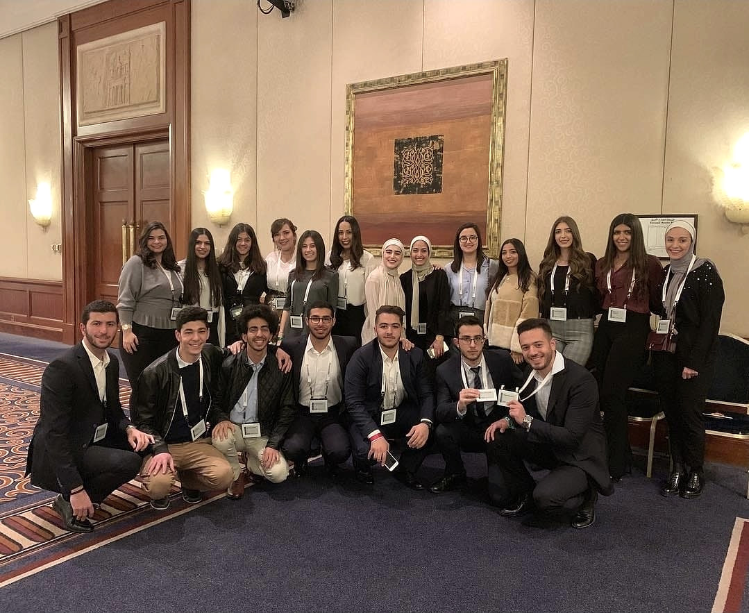 Large group of IISE–GJU students participating in a regional engineering conference in 2018.